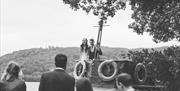 Black and White Photo of a Bridal Couple on a Windermere Lake Cruises Vessel in the Lake District, Cumbria