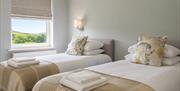 Bedroom 10 with two twin beds at Howgills House near Sedbergh, Cumbria
