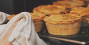 Pies being baked at Tebay Services Farmshop and Kitchen in Tebay, Cumbria