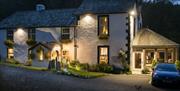 Exterior of The Cottage in the Wood near Braithwaite, Lake District at Night