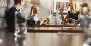 Family Enjoying Dining and Drinks at The Bistro At The Distillery in Bassenthwaite, Lake District