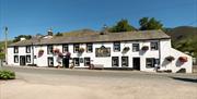 Exterior and Flowers in Bloom at The Horse and Farrier Inn in Threlkeld, Lake District