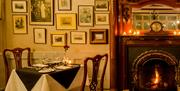 Seating and Fireplace at Oaks Restaurant, Broadoaks Country House in Troutbeck, Lake District