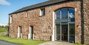 Exterior and entrance to Low Ploughlands Holiday Lets in Little Musgrave, Cumbria