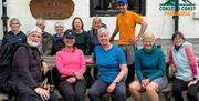 Visitors on a Walking Holiday with Coast to Coast Packhorse in the Lake District, Cumbria