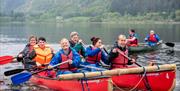 Visitors canoeing with Lake District Calvert Trust