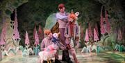 Actors performing on stage at The Victoria Wood Theatre in Bowness-on-Windermere, Lake District