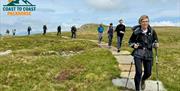 Visitors on a Running Holiday with Coast to Coast Packhorse in the Lake District, Cumbria