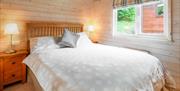 Bedroom at Woodlands Pine Lodges in Meathop, Lake District