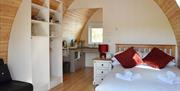 Glamping pod interior at Hill of Oaks Holiday Park in Windermere, Lake District