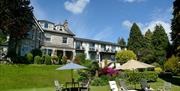 Exterior and garden seating at Clare House Hotel in Grange-over-Sands, Cumbria
