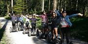 Visitors enjoying an experience with Lakeland Segway in Cartmel, Lake District