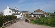 Houses as Seen from Paddle Beck Bridge at Southwaite Green Farm near Cockermouth, Cumbria