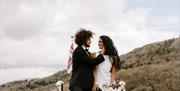 Bridal Couple on a Windermere Lake Cruises Vessel with a Scenic Backdrop in the Lake District, Cumbria