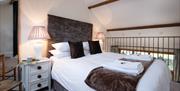 Double bed at Upper Crumble Cottage at Crumble Cottages near Cartmel, Lake District