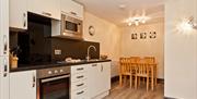 Kitchen and Dining Area in a Self Catered Unit at Burnside Park in Bowness-on-Windermere, Lake District