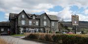 Exterior and signage at The Coniston Inn, Coniston, Lake District