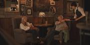 Guests seated at The Angel Inn in Bowness-on-Windermere, Lake District