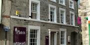 Exterior and signage at Plato's in Kirkby Lonsdale, Cumbria