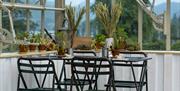 Seating at The Glasshouse at Another Place, The Lake in Watermillock, Lake District