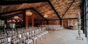 Ceremony seating at Hidden River Barn near Longtown, Cumbria
