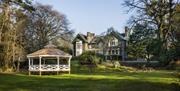 Grounds, gardens, and gazebo at Ambleside Manor Vegetarian Guest House in Ambleside, Lake District