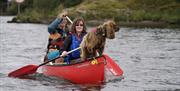 Visitors Canoeing with Anyone Can in the Lake District, Cumbria