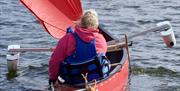 Visitors Canoe Sailing with Anyone Can in the Lake District, Cumbria