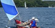 Visitors Canoe Sailing with Anyone Can in the Lake District, Cumbria