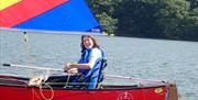 Visitors Canoe Sailing with Anyone Can in the Lake District, Cumbria