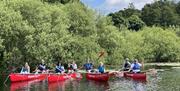 Visitors Canoeing with Anyone Can in the Lake District, Cumbria