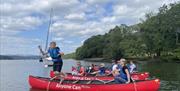 Visitors Canoeing with Anyone Can in the Lake District, Cumbria