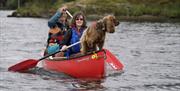 Visitors Canoeing with Anyone Can in the Lake District, Cumbria