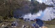 Visitors Canoeing with Anyone Can in the Lake District, Cumbria