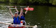 Visitors Canoeing with Anyone Can in the Lake District, Cumbria