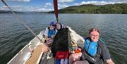 Visitors Sailing with Anyone Can in the Lake District, Cumbria