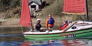 Visitors Sailing with Anyone Can in the Lake District, Cumbria