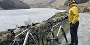 Man with Mountain Bikes from Arragon's Cycle Centre in Penrith, Cumbria
