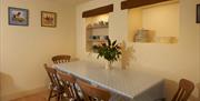 Dining Area at Autumn Cottage at Helm Mount Cottages in Barrows Green, Cumbria