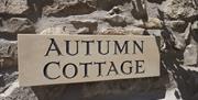 Signage Outside of Autumn Cottage at Helm Mount Cottages in Barrows Green, Cumbria