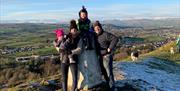 Family on a Walk near Autumn Cottage at Helm Mount Cottages in Barrows Green, Cumbria