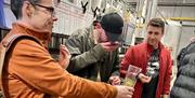 Visitors on a Brewery Tour at Bowness Bay Brewing in Kendal, Cumbria