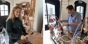 Smiling Visitors at a Gin Making Workshop at Black Cat Distillery at Brougham Castle near Penrith, Cumbria