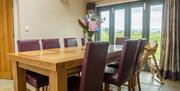 Dining area at Low Ploughlands Holiday Lets in Little Musgrave, Cumbria