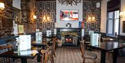 Restaurant seating at The Manor Inn in St Bees, Cumbria