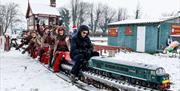 Staff Riding the Train at Barrow Christmas, held by BarrowFull in Barrow-in-Furness, Cumbria