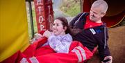 Visitors Enjoying Accessible Activities at Bendrigg Trust in the Lake District, Cumbria