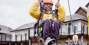 Visitors Enjoying Accessible Climbing at Bendrigg Trust in the Lake District, Cumbria
