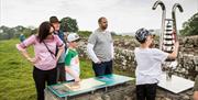 Family Viewing Signage and Exhibit at Birdoswald Roman Fort near Brampton, Cumbria