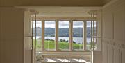 View of Windermere from The White Drawing Room at Blackwell, the Arts & Crafts House, Bowness-on-Windermere, Lake District.